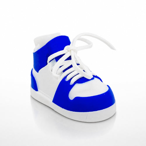 Blue and white sneaker on a light gray background