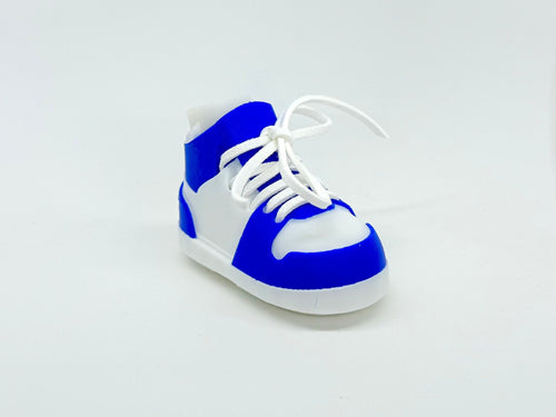 Blue and white sneaker on a light gray background