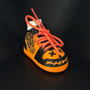 Sugar Skull Shoe Pair, three-quarter view of the jack-o'-lantern toe and sugar skull.