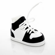 Black and white high-top sneaker on a light gray background