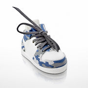 Grey Camo Shoe Pair, three-quarter view. White shoe shell with grey and blue camo panels and grey laces.